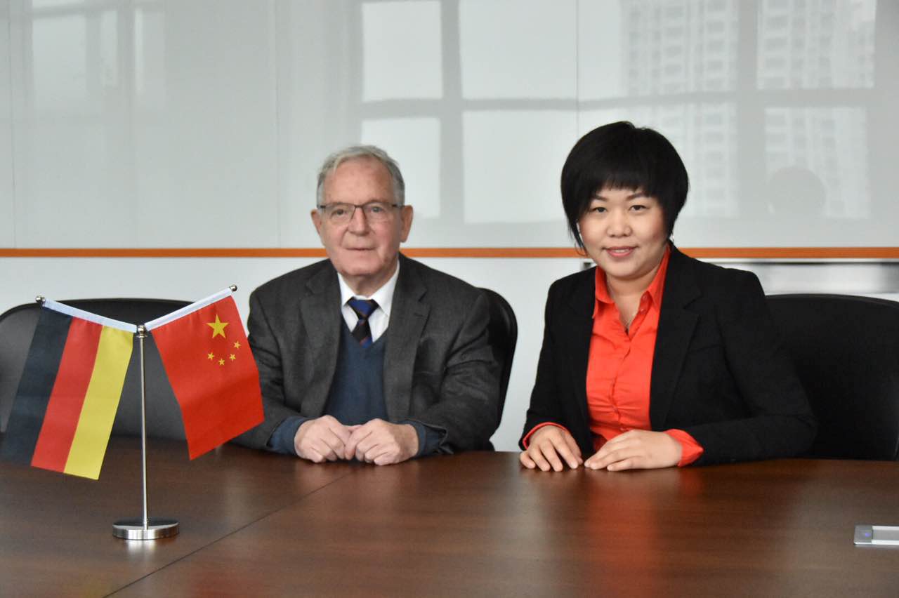 Manfred H. Krost and Elke Xia at a China-Germany business meeting